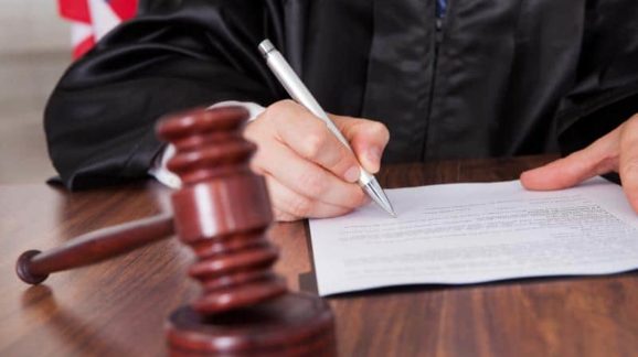 Judge and documents - Thinkstock